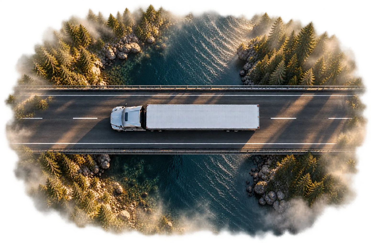 Aerial view of a truck crossing a bridge through a forest